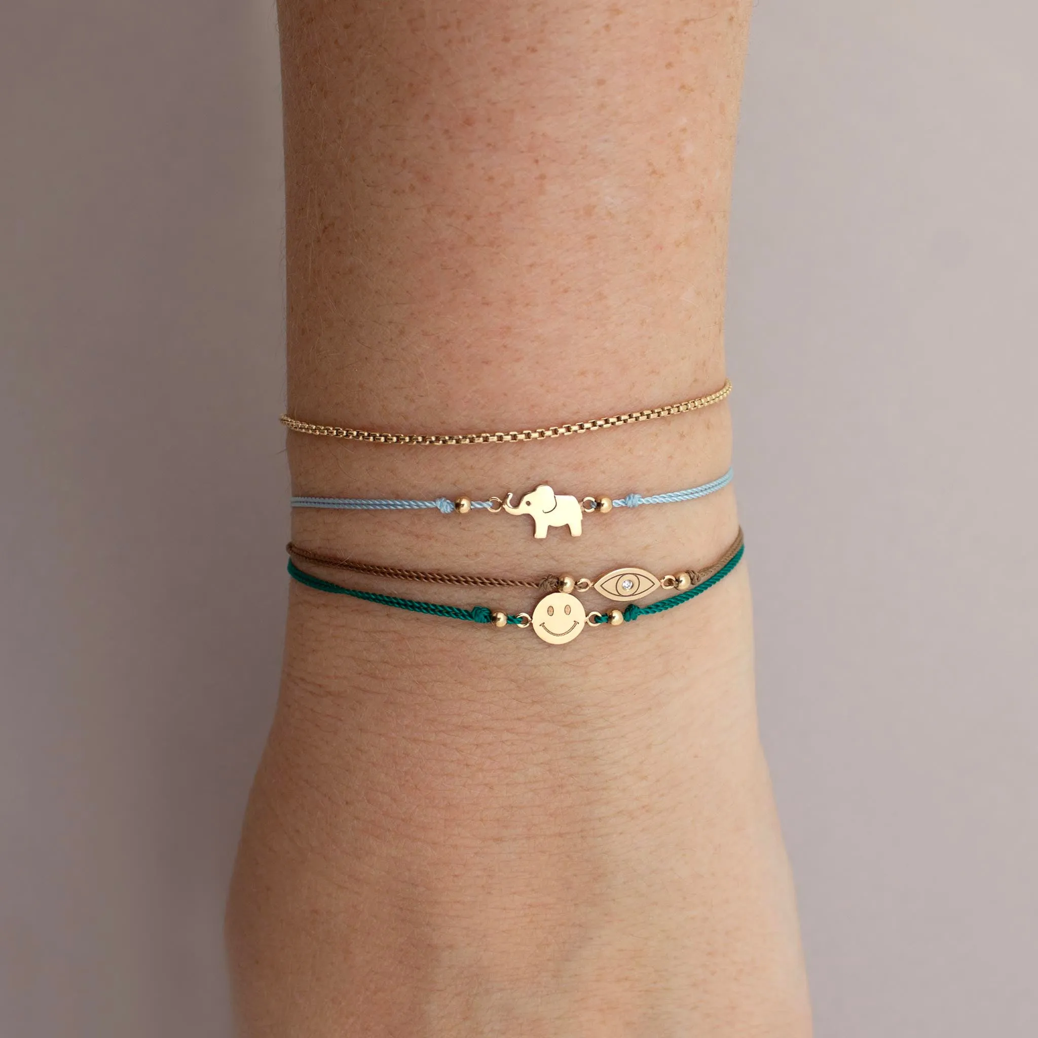 14k Midi Bitty Smiley Face Cord Bracelet