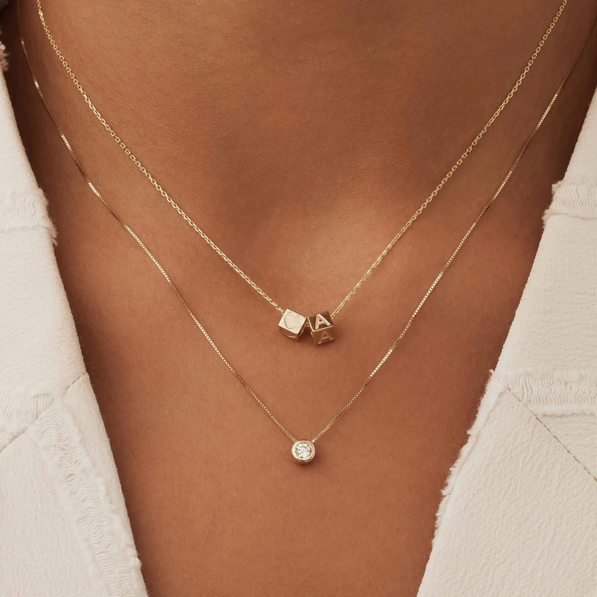 Cadeau d'Isabel 14 karat gold cube charm with heart and gold necklace gift set