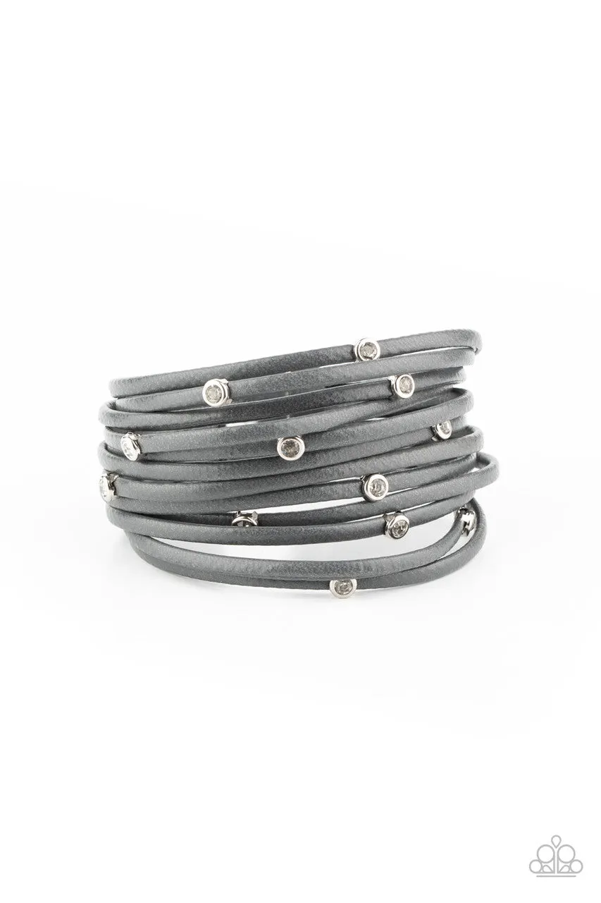 Fearlessly Layered - Silver - White Rhinestone Studded Gray Leather Paparazzi Magnetic Bracelet