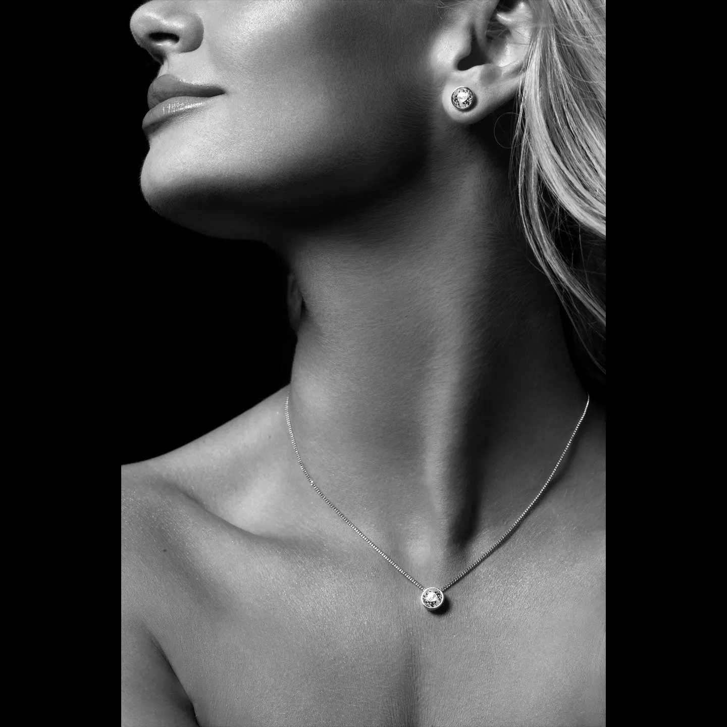 Harley Small Pendant Necklace with Blue Aquamarine Round Crystals from Swarovski Silver Toned Rhodium Plated