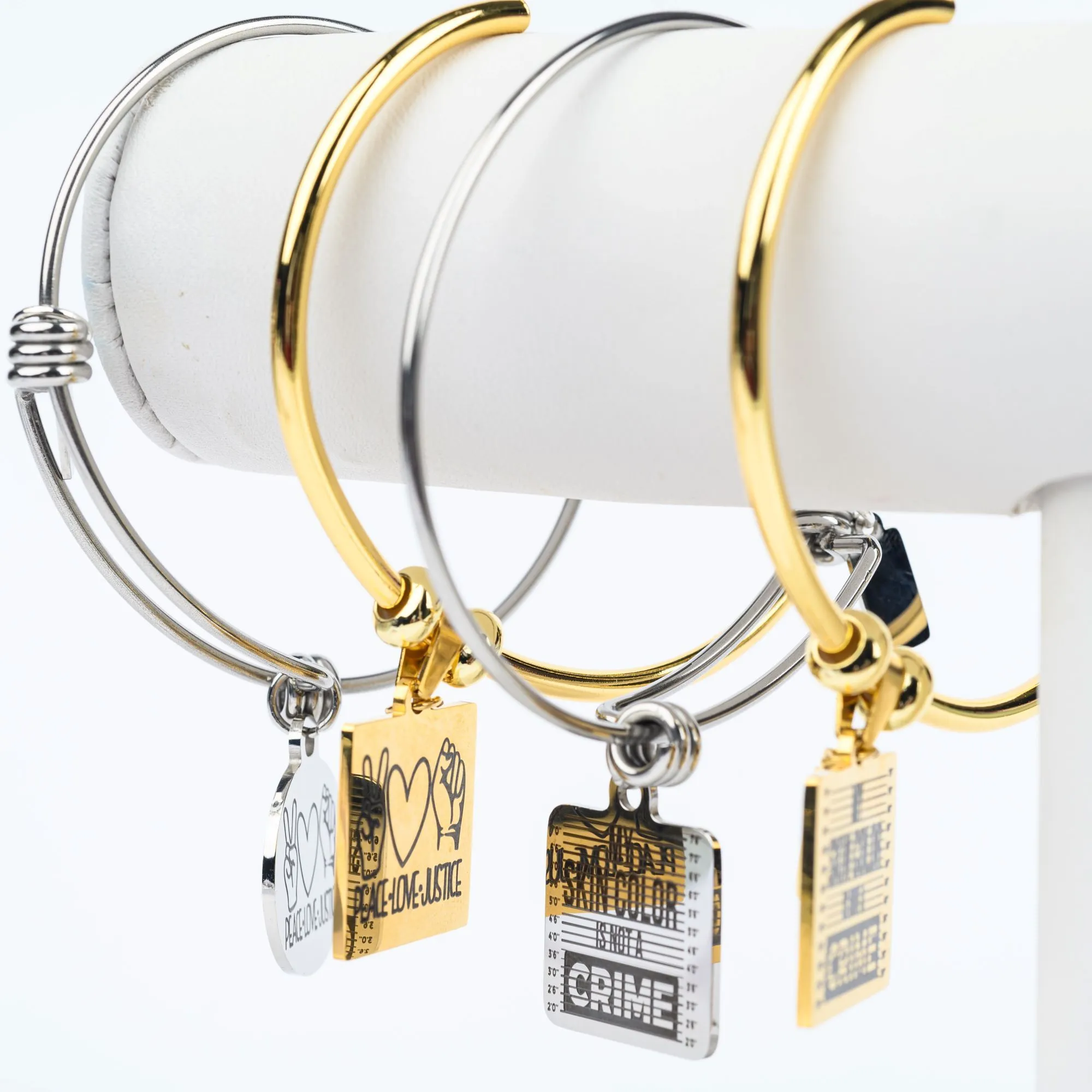 ME™ Word. My Skin Color Is Not a Crime Bangle - Gold