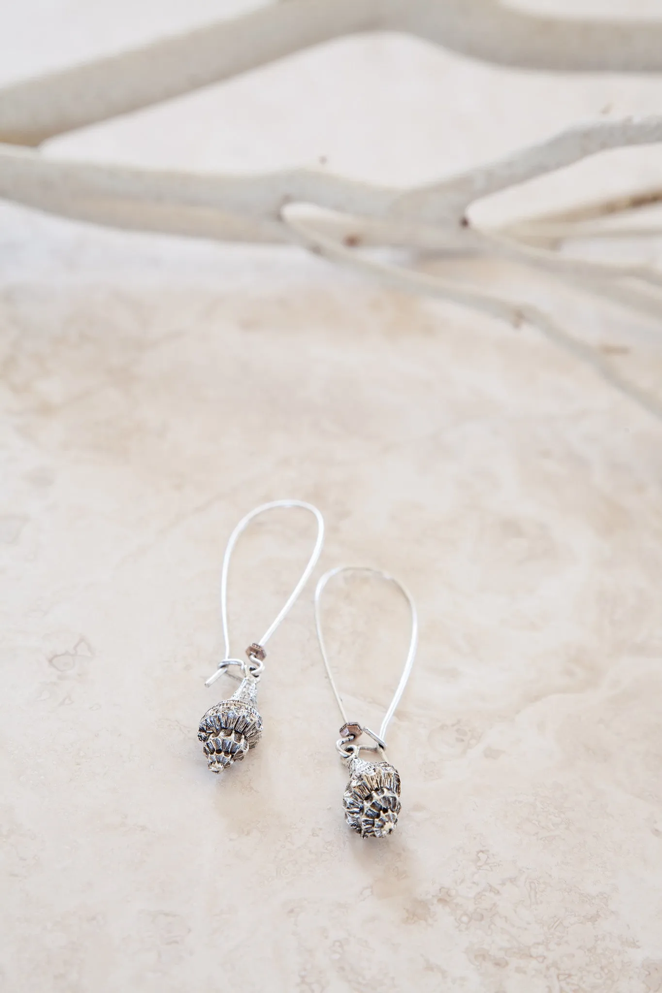 Silver Plated Trumpet Shell Earrings