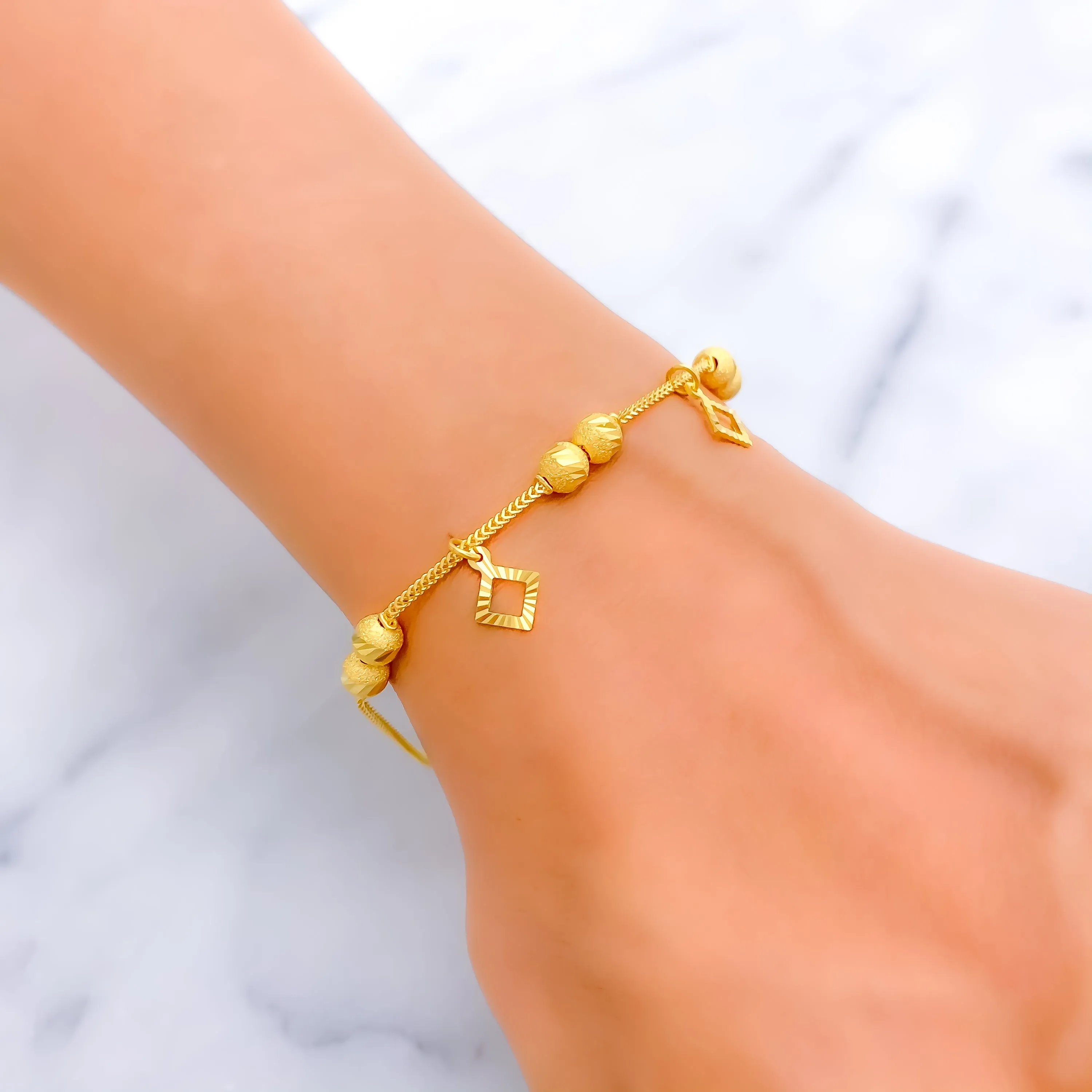Versatile Ethereal 22k Gold Charm Bracelet