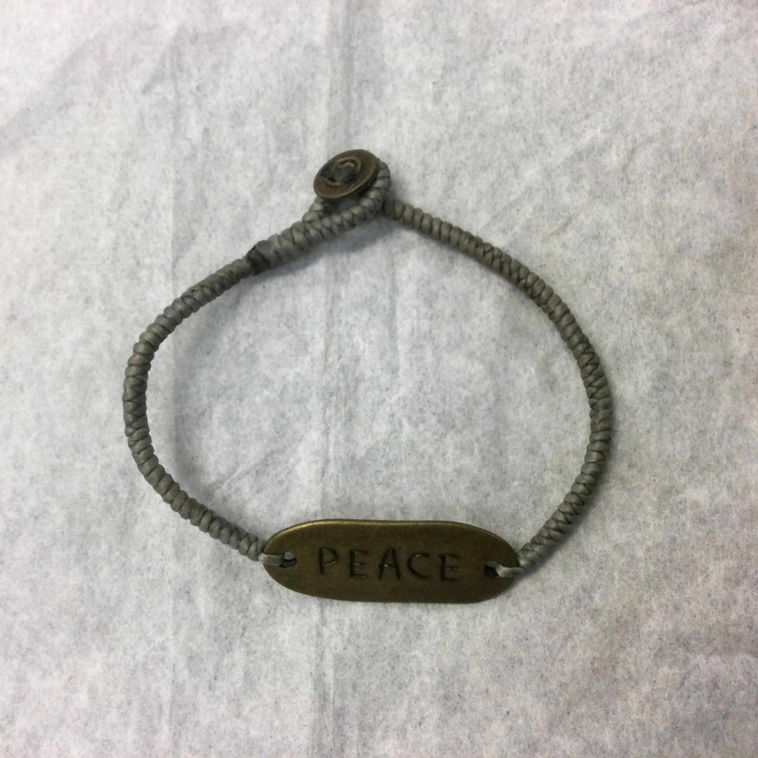 Woven Wax Cord Bracelet with Brass Peace Plaque